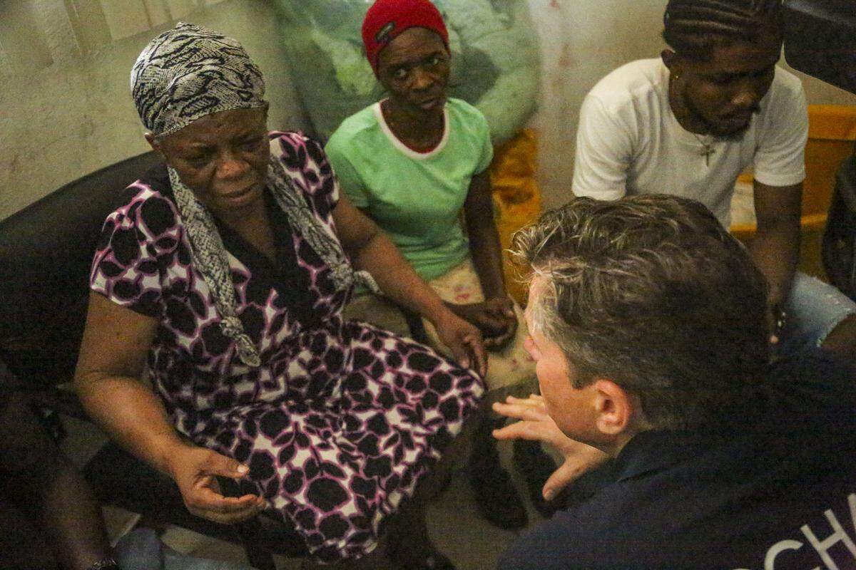 “I am not living well,” Roseni Charlot, 67, tells Tom Fletcher, the United Nations under-secretary-general for humanitarian affairs and emergency relief coordinator during a visit on Tuesday, September 9, 2025, to a displacement camp on the grounds of a government ministry in Delmas 33. Charlot was chased from her burning home by armed gangs nearly two years ago.
