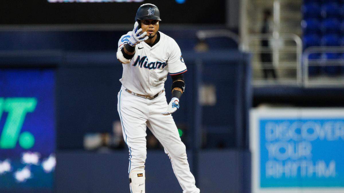 Miami Marlins second base Luis Arraez (3) reacts to hitting a double during the first inning of a baseball game on Thursday, May 2, 2024, at loanDepot Park in Miami, Fla.