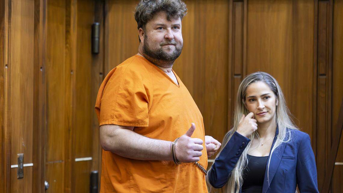 Travis Grafe, son of the former Knaus Berry Farms owners, reacts as he attends court for a competency hearing at the Richard E. Gerstein Justice Building on Friday, Sept. 26, 2025, in Miami, Fla. He is accused of beating his mother, Rachel Knaus Grafe, to death.