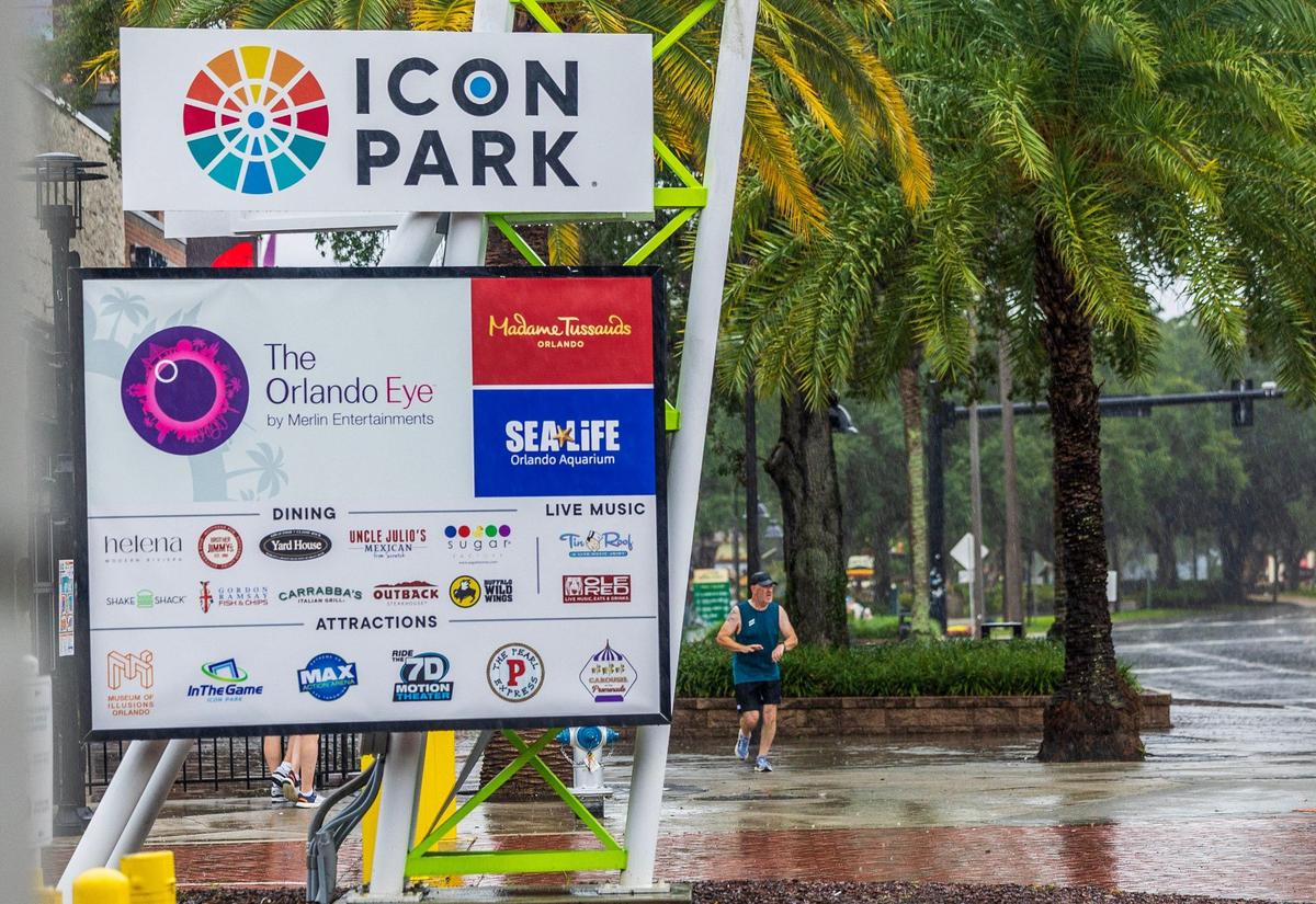 Rory McCullough of Ireland goes for a run by the Icon Park entrance, in Orlando, that have closed to the public as hurricane Milton approaches the West coast of Florida and then makes its way to the East coast, on, Wednesday October 09, 2024.