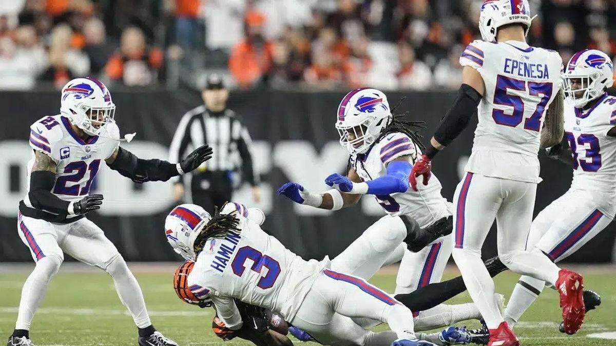 Buffalo Bills safety Damar Hamlin collides with Cincinnati Bengals wide receiver Tee Higgins during an NFL football game on Jan. 2. Hamlin was injured on the play.