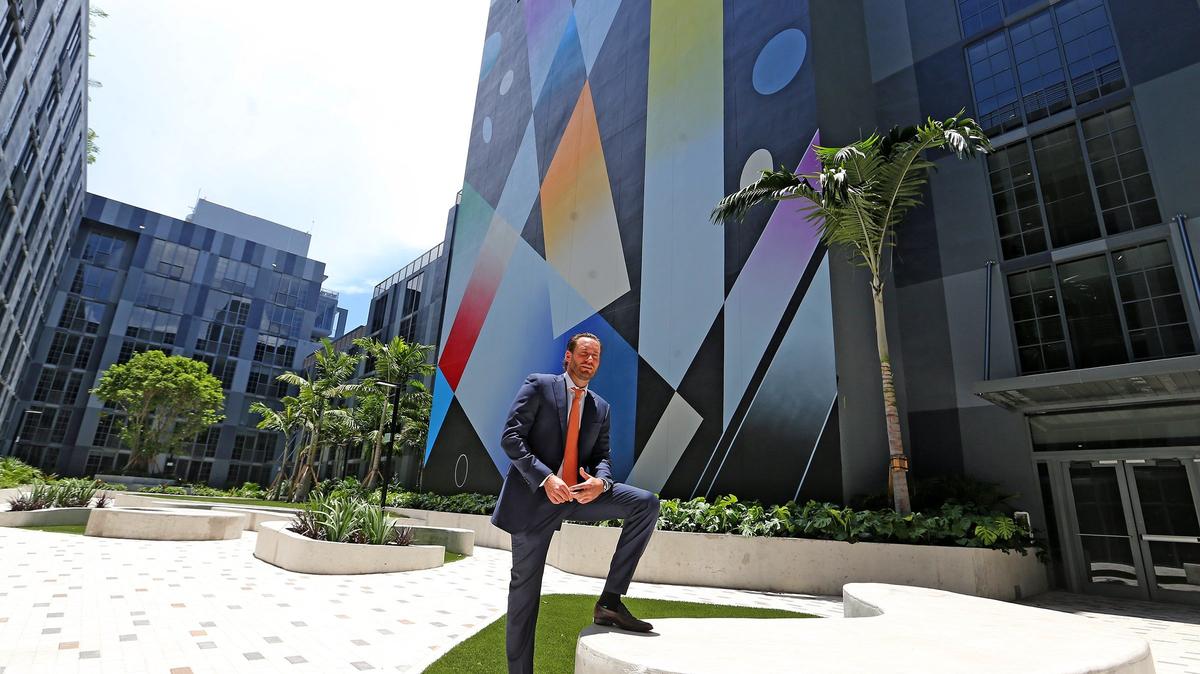Developer Jon Paul Pérez stands in the courtyard at Wynwood 25, the first new apartment rental building in Wynwood since 2015.