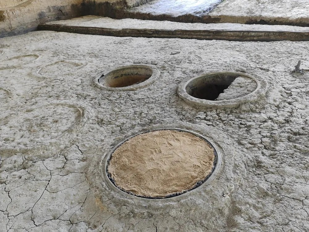 Large cylinders packed with soil and rocks were placed in the dirt of the foundation, adding structural integrity.