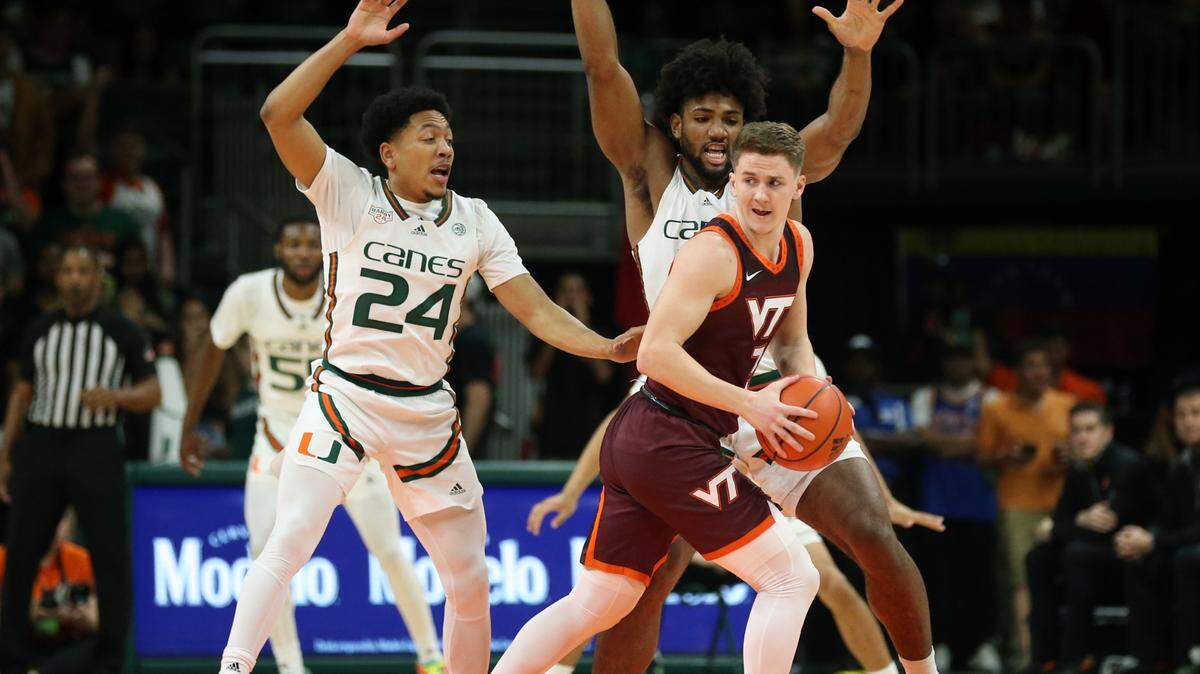 Miami Hurricanes guard Nijel Pack (24) and forward Norchad Omier (15) will be together on the court again next season after both announced they withdrew their names from the NBA Draft and are returning to UM.