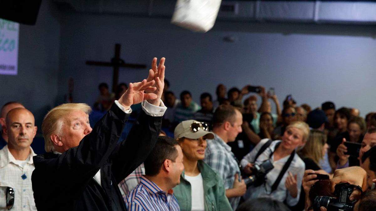 In the wake of Hurricane Maria’s destruction in 2017, President Trump tosses paper towels at a news conference in Puerto Rico.