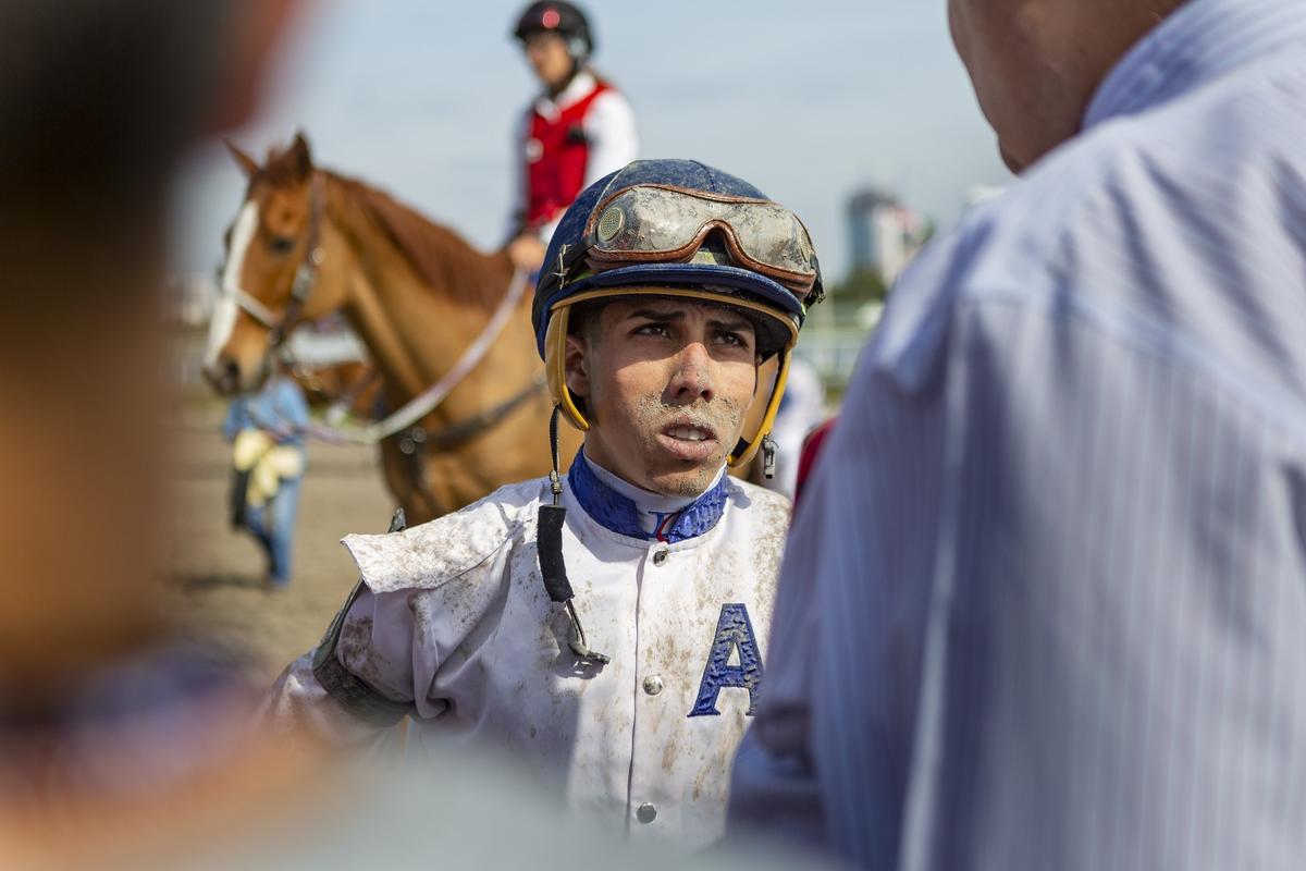 Irad Ortiz Jr. is covered in dirt after competing in a race at Gulfstream Park in Hallandale Beach, Florida, on Wednesday, Jan. 9, 2019. Ortiz and his brother Jose are regarded as two of the best jockeys in the nation.