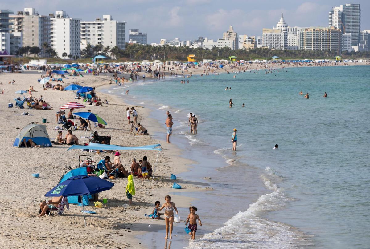 People gather at South Pointe Beach during spring break on Friday, March 8, 2024, in Miami Beach, Fla.&nbsp;