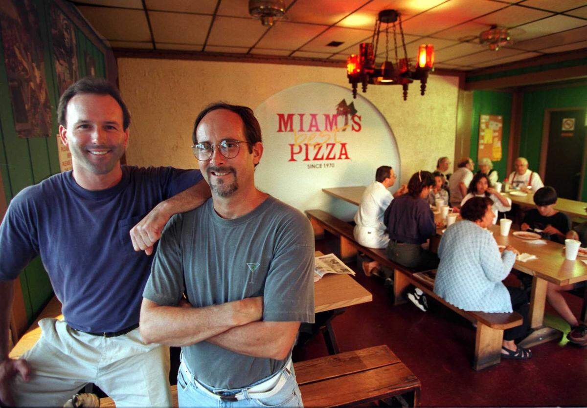 Thelvius Winieckie, (left) and Charles Butler, (right) when the brothers-in-law were at Miami’s Best Pizza’s original location at 1514 S. Dixie Hwy., in this Nov. 29, 1996 file photo.