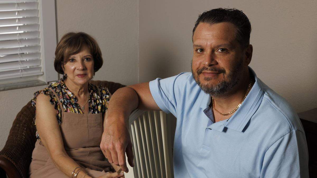 Ivonne Gonzalez, left, and Ozzie Echemendia, who both underwent DBS surgery, a minimally invasive brain surgery called deep brain stimulation, to reduce the effects of ParkinsonÕs disease, pose inside her home on Tuesday, April 28, 2026, in Miami, Fla. Echemendia convinced Gonzalez to get the surgery. ÒThis has given me a second chance, back then at the worst point, I was bed ridden, I couldnÕt speak; I was reborn,Ó said Echemendia.  