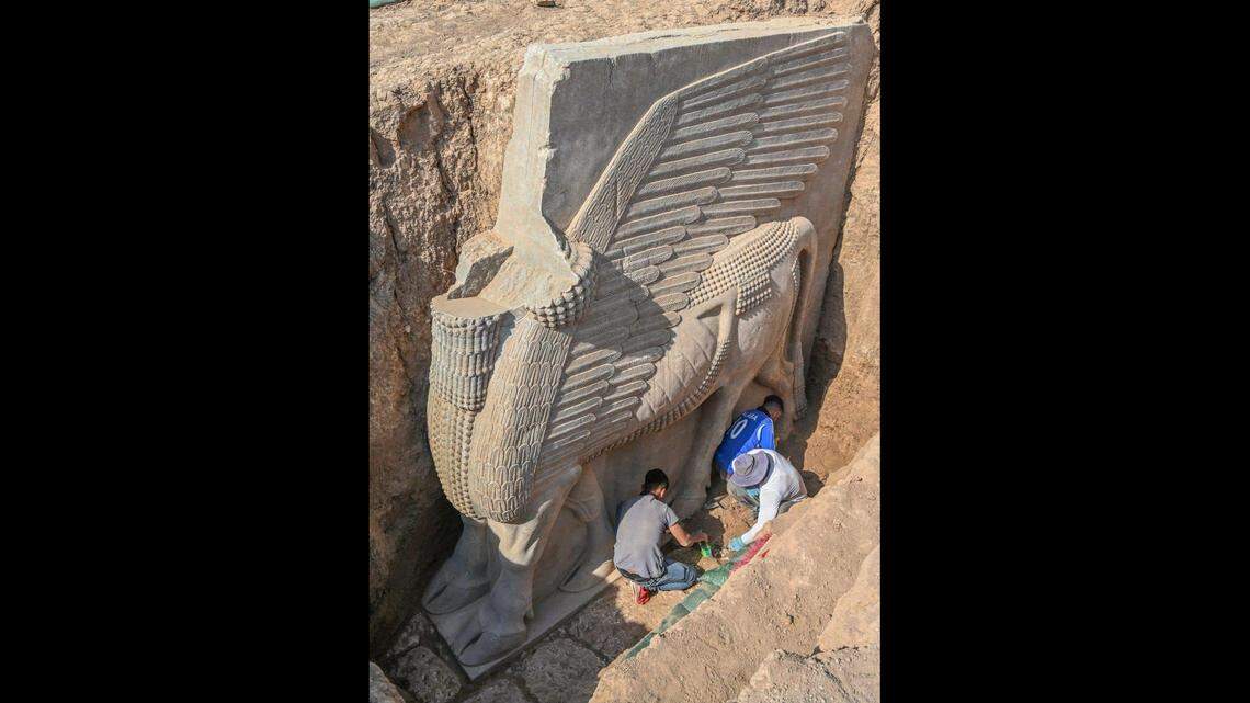 An ancient lamassu was excavated after it was buried in Iraq, officials said.