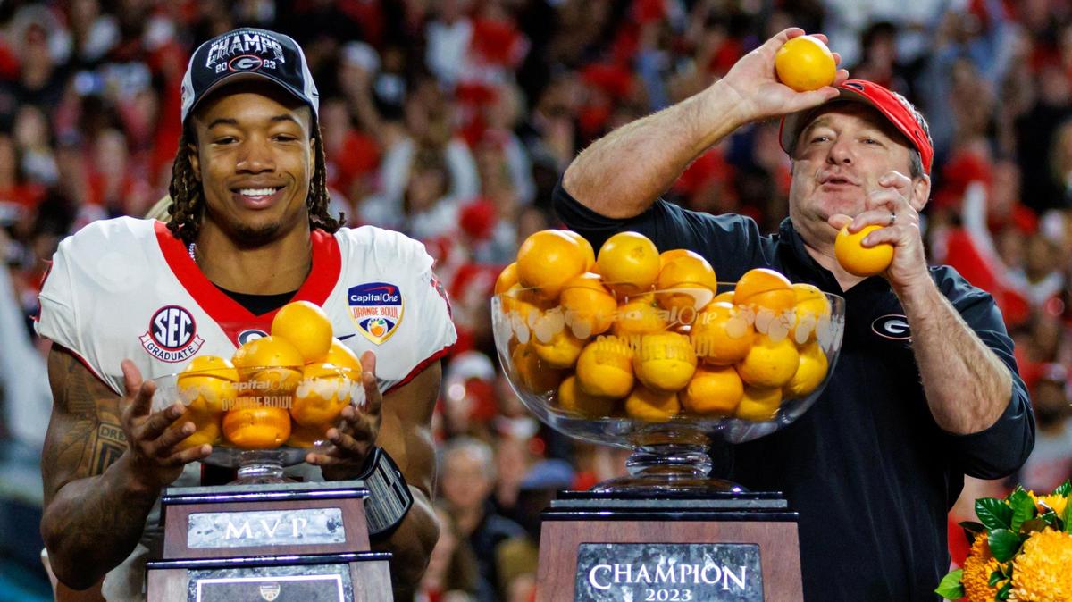Georgia Bulldogs head coach Kirby Smart Georgia Bulldogs running back Kendall Milton (2) celebrate after defeating Florida State in he 90th annual Capital One Orange Bowl at Hard Rock Stadium on Saturday, Dec. 30, 2023 in Miami Gardens, Fla.