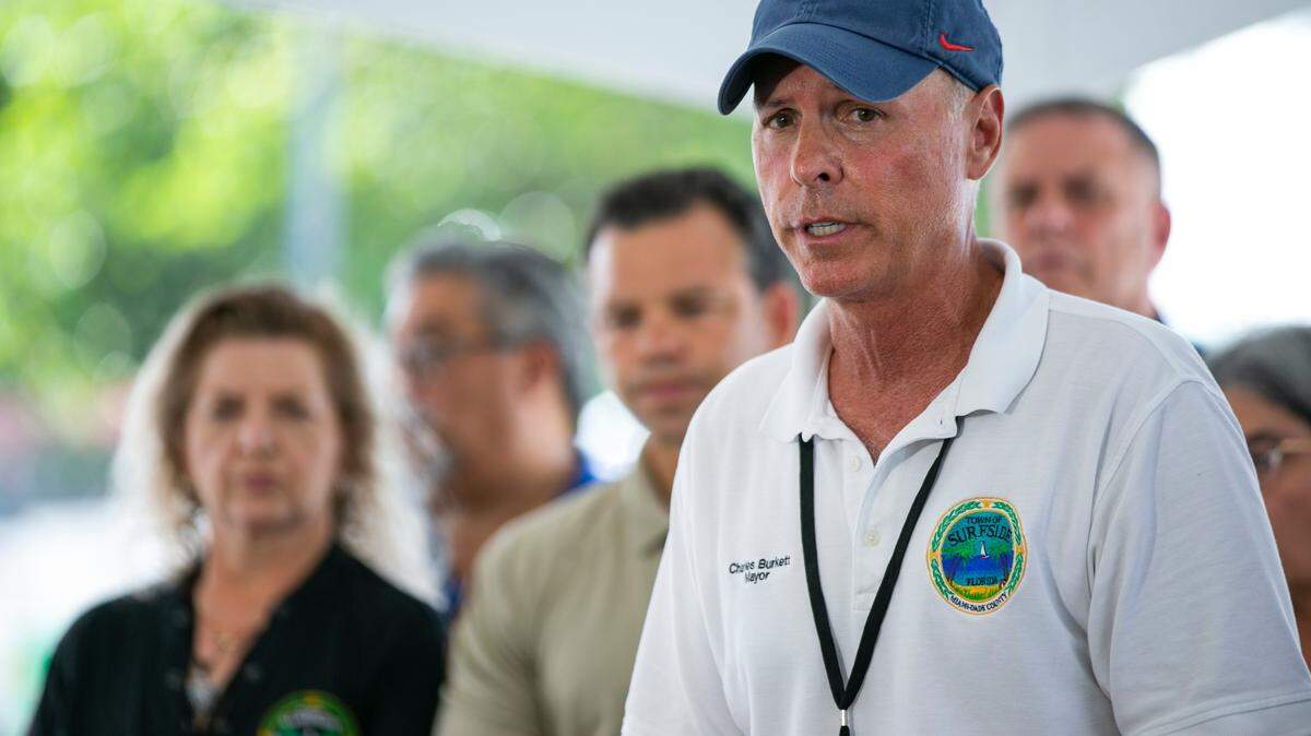 Surfside Mayor Charles Burkett speaks to the media about the collapsed Champlain Towers South condo building in Surfside, Florida, on Friday, July 9, 2021.