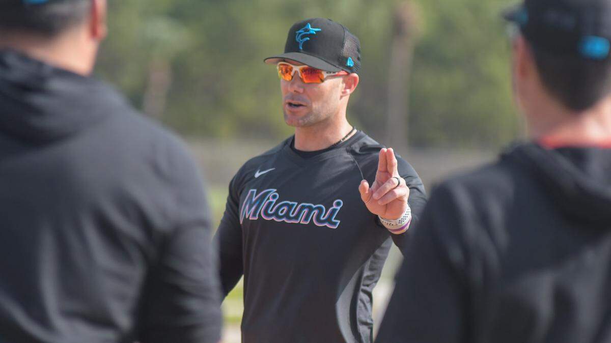 Miami Marlins manager Skip Schumaker gives instructions during a spring training workout on Feb. 17, 2023, at the Roger Dean Chevrolet Stadium complex in Jupiter, Florida.