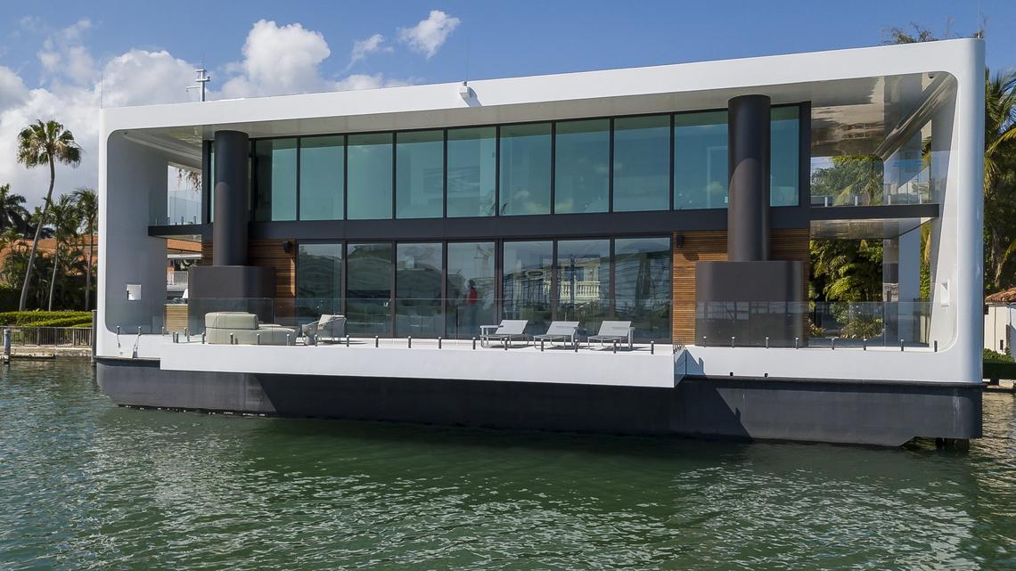 The Arkup houseboat, a green-energy luxury floating home that can adapt to sea rise, docks off Palm Island near Miami Beach on Saturday, April 27, 2019. The floating house has solar panels, impact resistant windows and can withstand hurricane winds of up to 155 miles per hour.