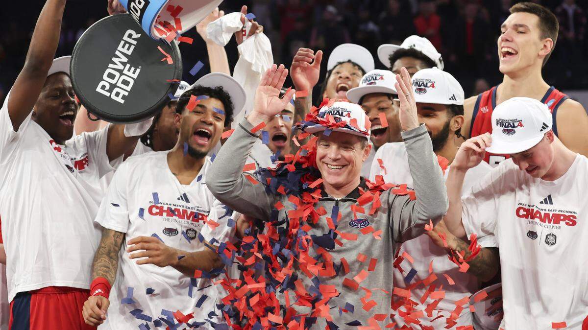 Florida Atlantic Owls head coach Dusty May reacts after having confetti dumped on him following their 79-76 victory against the Kansas State Wildcats in an NCAA tournament East Regional final at Madison Square Garden.