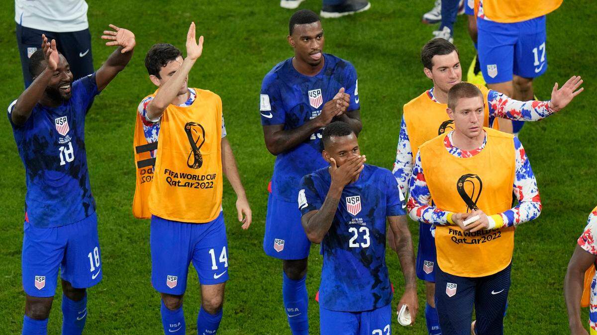 U.S. players react at the end of the World Cup group B soccer match between Iran and the United States at the Al Thumama Stadium in Doha, Qatar, Wednesday, Nov. 30, 2022.