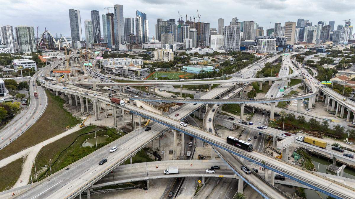 An aerial view of traffic along I-395, SR 836 and I-95 heading to and from downtown Miami, Florida, on Wednesday, January 21, 2026.