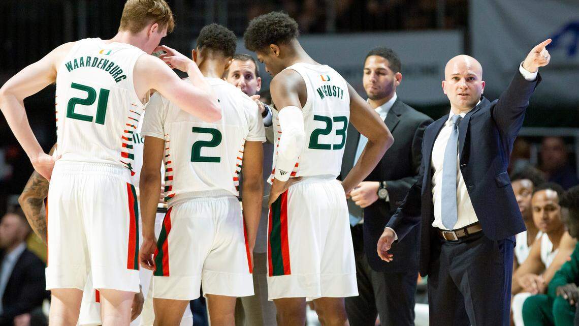 Miami Hurricanes associate head coach Chris Caputo speaks to referees in the first half of a basketball game against the Alabama A&M Bulldogs at Watsco Center on Saturday, December 14, 2019. Caputo substituted for head coach Jim Larranaga as he was experienceing back spasms.
