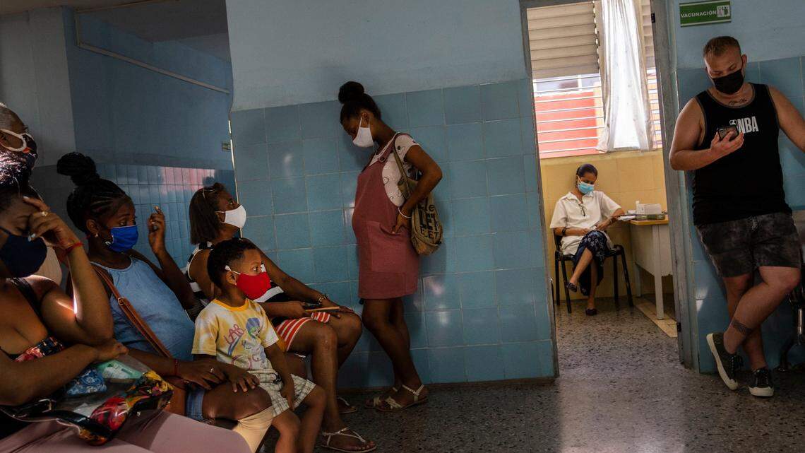A pregnant woman waits to get a shot of the Cuban Abdala vaccine for COVID-19 at a clinic during the new coronavirus pandemic in Havana, Cuba, Thursday, Aug. 5, 2021. (AP Photo/Ramon Espinosa)