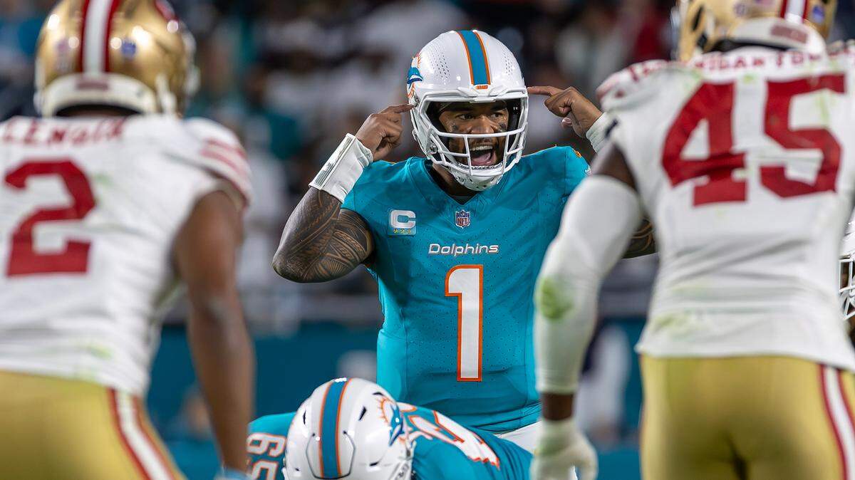 Miami Dolphins quarterback Tua Tagovailoa (1) calls a play during the second half of their NFL game against the San Francisco 49ers at Hard Rock Stadium on Sunday, Dec. 22, 2024, in Miami Gardens, Florida.