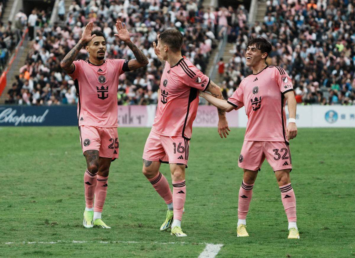 [US, Mexico & Canada customers only] Feb 4, 2024; Hong Kong, HONG KONG; Inter Miami player Robert Taylor celebrates with Gregore and Noah Allen after scoring their first goal in a preseason friendly soccer match against Hong Kong XI at Hong Kong Stadium. Mandatory Credit: Lam Yik/Reuters via USA TODAY Sports