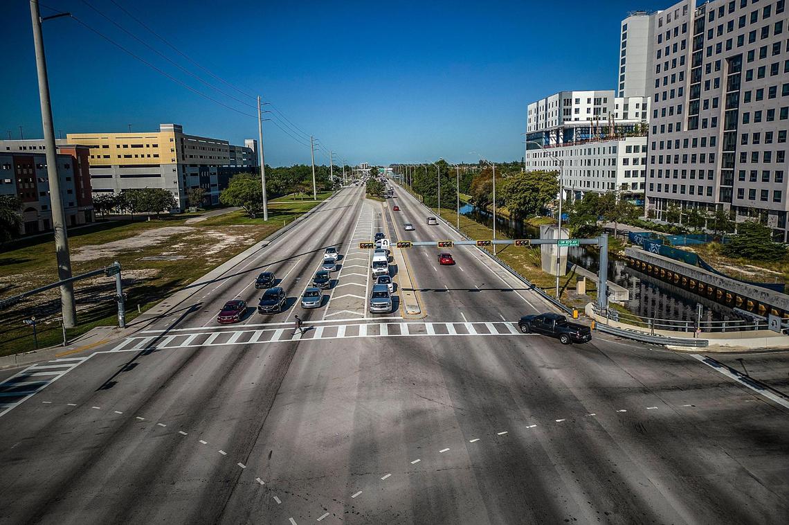 An overhead view shows the intersection of Southwest Eighth Street and 109th Avenue, where a pedestrian bridge collapsed while under construction in 2018, killing six people. Construction is expected to start in early 2024 on a planned new bridge across Southwest Eighth to link FIU’s main campus, at left, with Sweetwater’s University City.