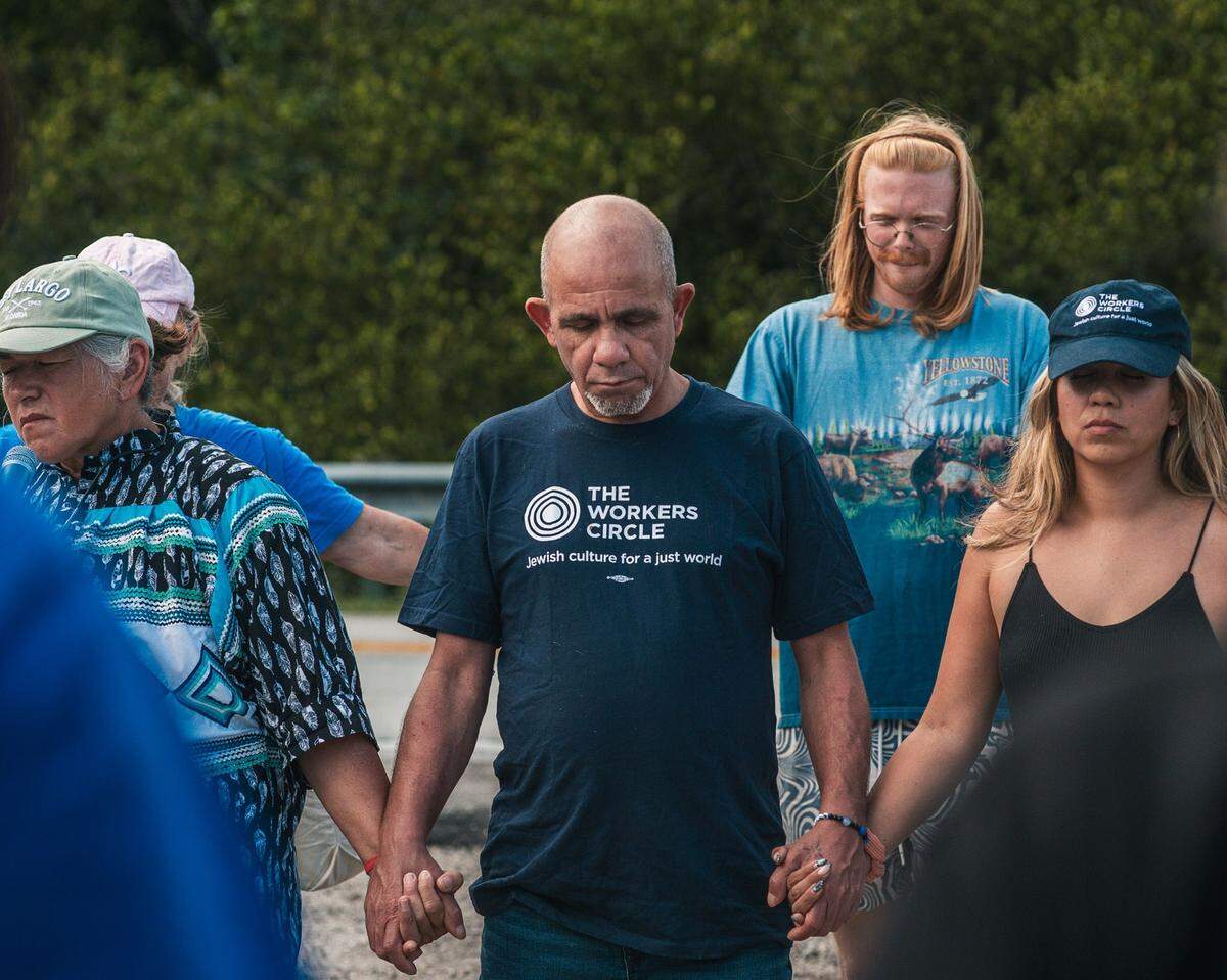 Justo and Arianne Betancourt at the weekly vigil outside Alligator Alcatraz.