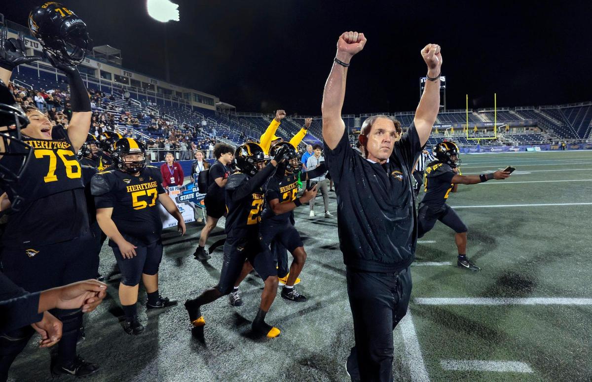 Coach Mike Smith reacts after American Heritage defeats Jones High School in the Florida High School Football State Championships - Class 4A game at Pitbull Stadium on the campus of Florida International University in Miami, Florida, on Friday, December 13, 2024.