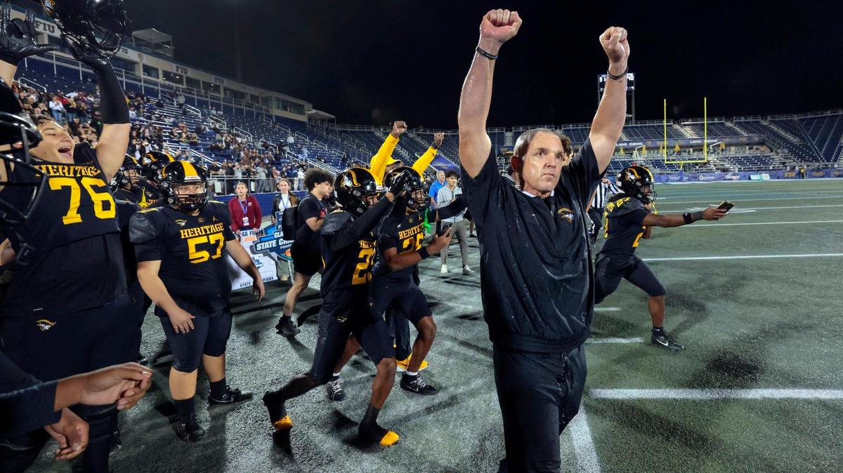 Coach Mike Smith reacts after American Heritage defeats Jones High School in the Florida High School Football State Championships - Class 4A game at Pitbull Stadium on the campus of Florida International University in Miami, Florida, on Friday, December 13, 2024.
