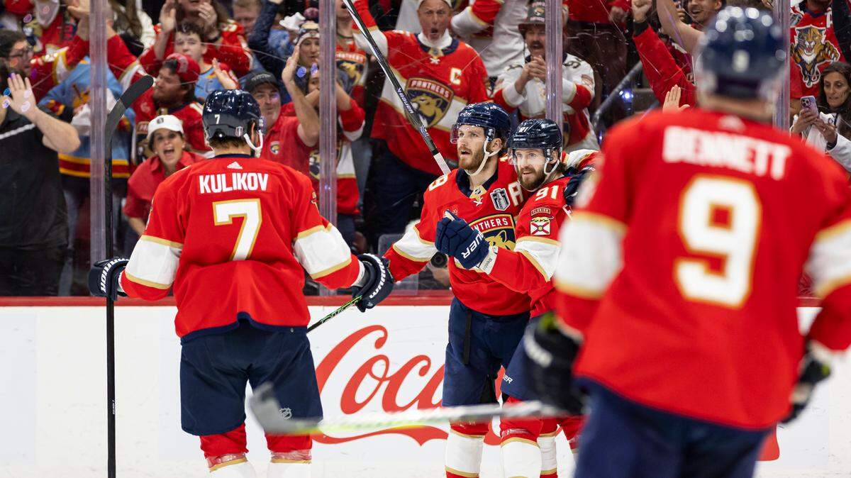 Florida Panthers defenseman Oliver Ekman-Larsson (91) celebrates with his teammates after scoring against the Edmonton Oilers in the third period of Game 5 of the NHL Stanley Cup Final at the Amerant Bank Arena on Tuesday, June 18, 2024, in Sunrise, Fla.