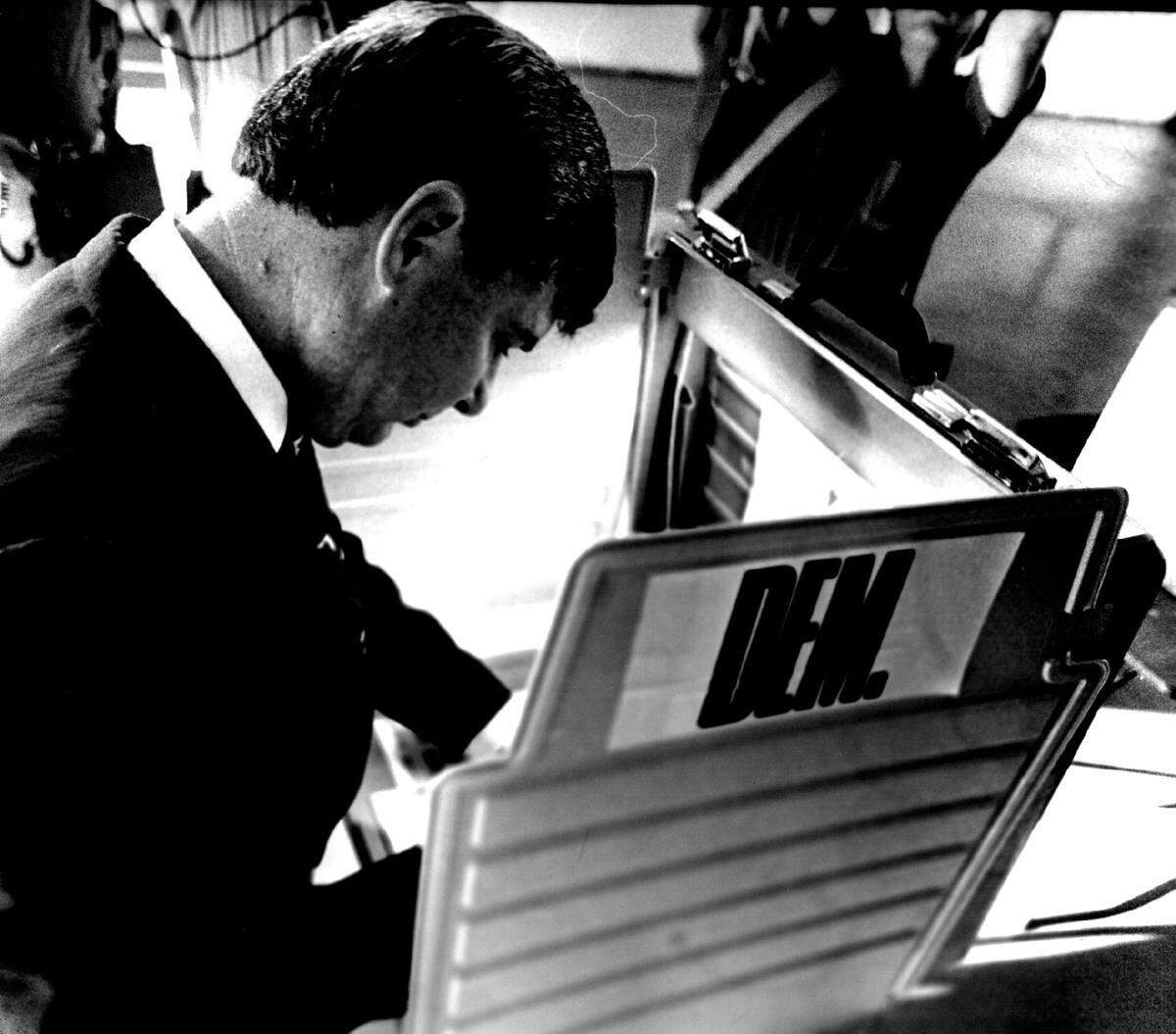 Florida Gov. Bob Graham votes at a Miami Lakes fire station in 1982.