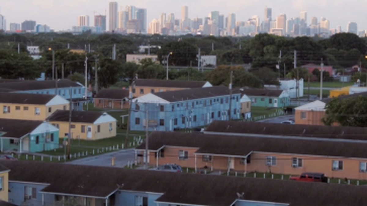An overhead shot of the old Liberty Square with the Miami skyline in the background in the new documentary, ’Razing Liberty Square.’ When Bea Hines grew up there, it was a neighborhood where people kept their doors unlocked and children played in the only playground for Black children in the city of Miami.