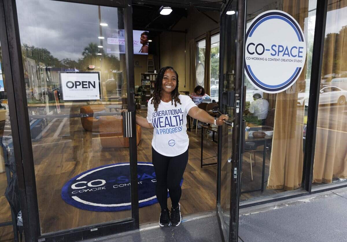 Founder Joy St. Clair leads a tour through Co-Space, a coworking space with a podcast studio and private meetings rooms, on Wednesday, June 3, 2026, in Miami Gardens, Fla. Co-Space is a Black-owned business that gives many Black entrepreneurs and founders in South Florida a place to work where they feel seen