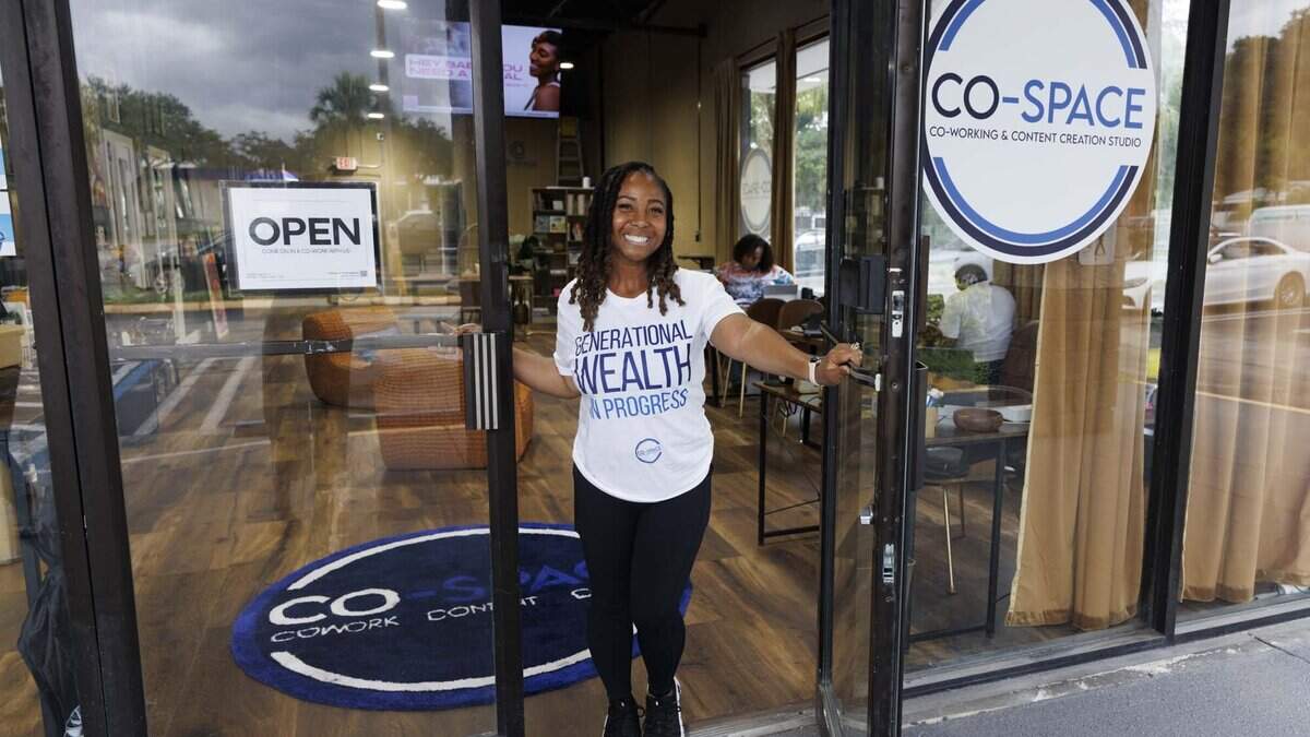 Founder Joy St. Clair leads a tour through Co-Space, a co working space with a podcast studio and private meetings rooms, on Wednesday, June 3, 2026, in Miami Gardens, Fla. Co-Space is a Black-owned business that gives many Black entrepreneurs and founders in South Florida a place to work where they feel seen
