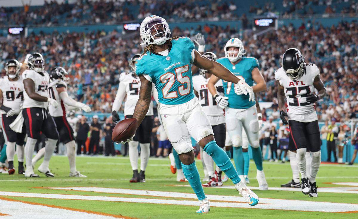 Miami Dolphins running back Jaylen Wright (25) reacts after scoring against the Atlanta Falcons in the second quarter at Hard Rock Stadium, in Miami Gardens, Florida on Friday, August 9, 2024.