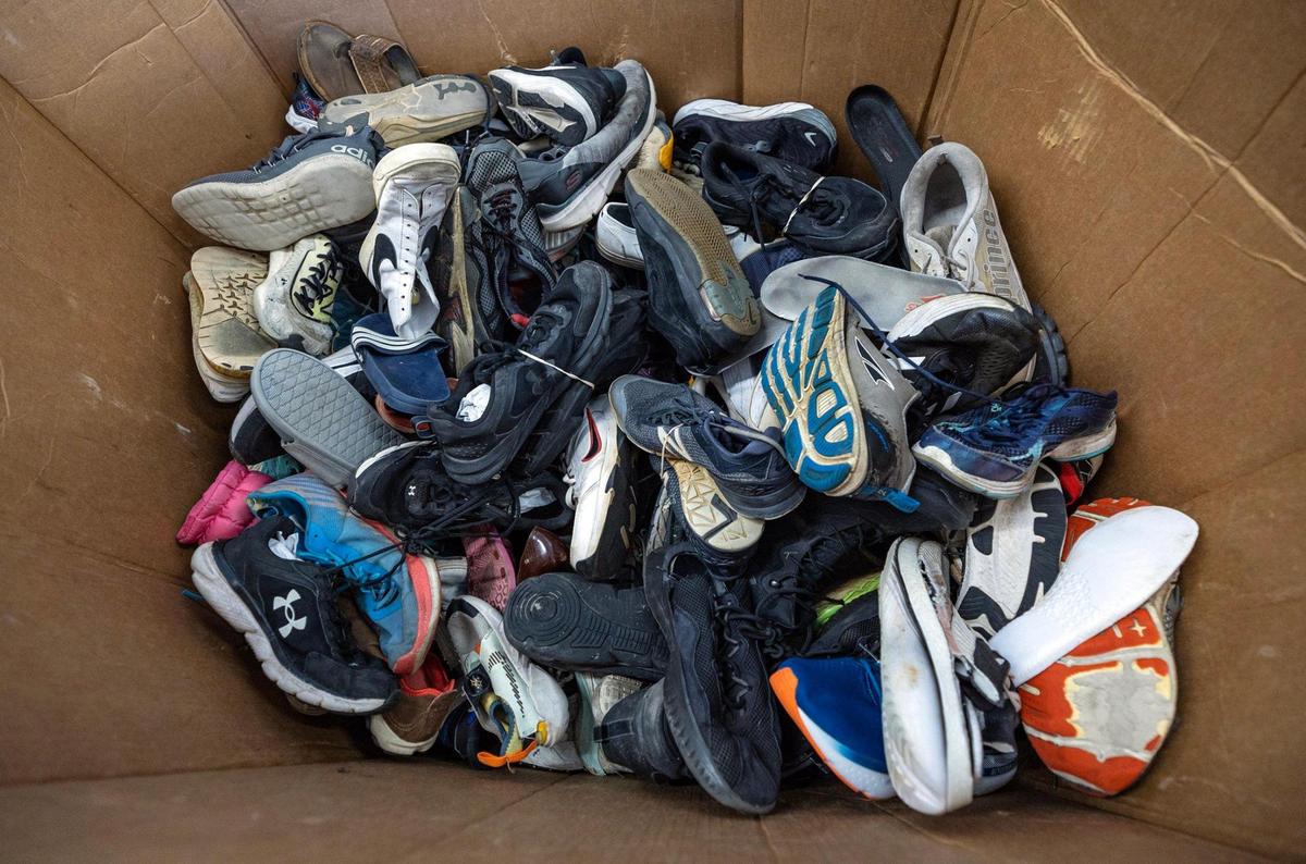 Sneaker Impact processes and collects recycled sneakers that would otherwise be thrown away as trash. Employees send most of the shoes to resell businesses overseas and shred the ones beyond repair into raw materials like rubber that can be repurposed.