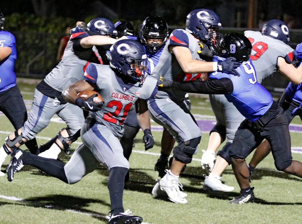 Columbus Explorers running back Agyeman Addae (21) runs the ball against South Dade Buccaneers during football game on Saturday, September 28, 2024 at Harris Field Park in Homestead. Andrew Uloza / for Miami Herald