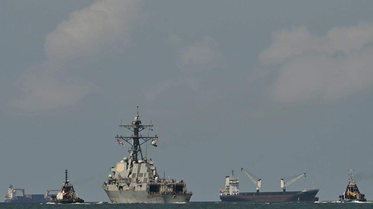 The USS Gravely departs from the Port of Spain on Oct. 30, 2025. The U.S. warship arrived in Trinidad and Tobago on Oct. 26, 2025, for joint exercises near the coast of Venezuela, as Washington ratcheted up pressure on drug traffickers and Venezuelan leader Nicolás Maduro.