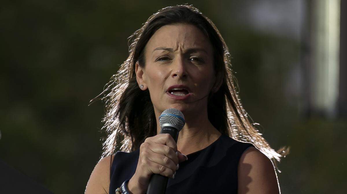 Commissioner of Agriculture Nikki Fried speaks during a Barack Obama drive-in rally in support of Joe Biden near Florida International University in Miami on Monday, November 2, 2020.