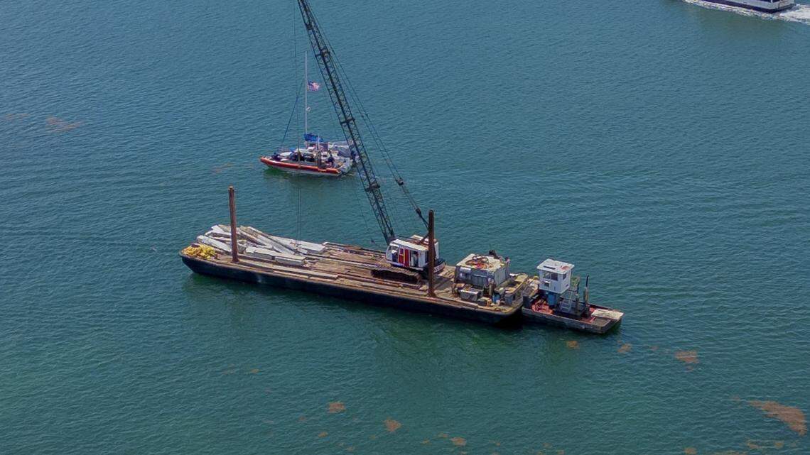 Parents of three girls who died in barge-sailboat crash sue barge company