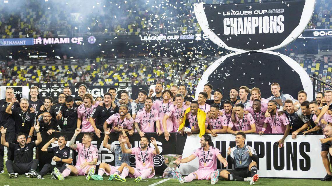Inter Miami players and coaching staff celebrate with the Leagues Cup after defeating Nashville SC in the final match of the tournament at GEODIS Park on Saturday, Aug. 19, 2023, in Nashville, Tenn.
