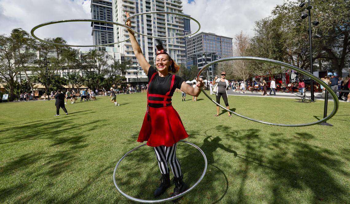 Ali Hoop Mama with Rainbow Circus, performs at Huizenga Park as it reopens to the public with a ribbon cutting ceremony after a major renovation in Fort Lauderdale, Florida, on Saturday, January 24, 2026.