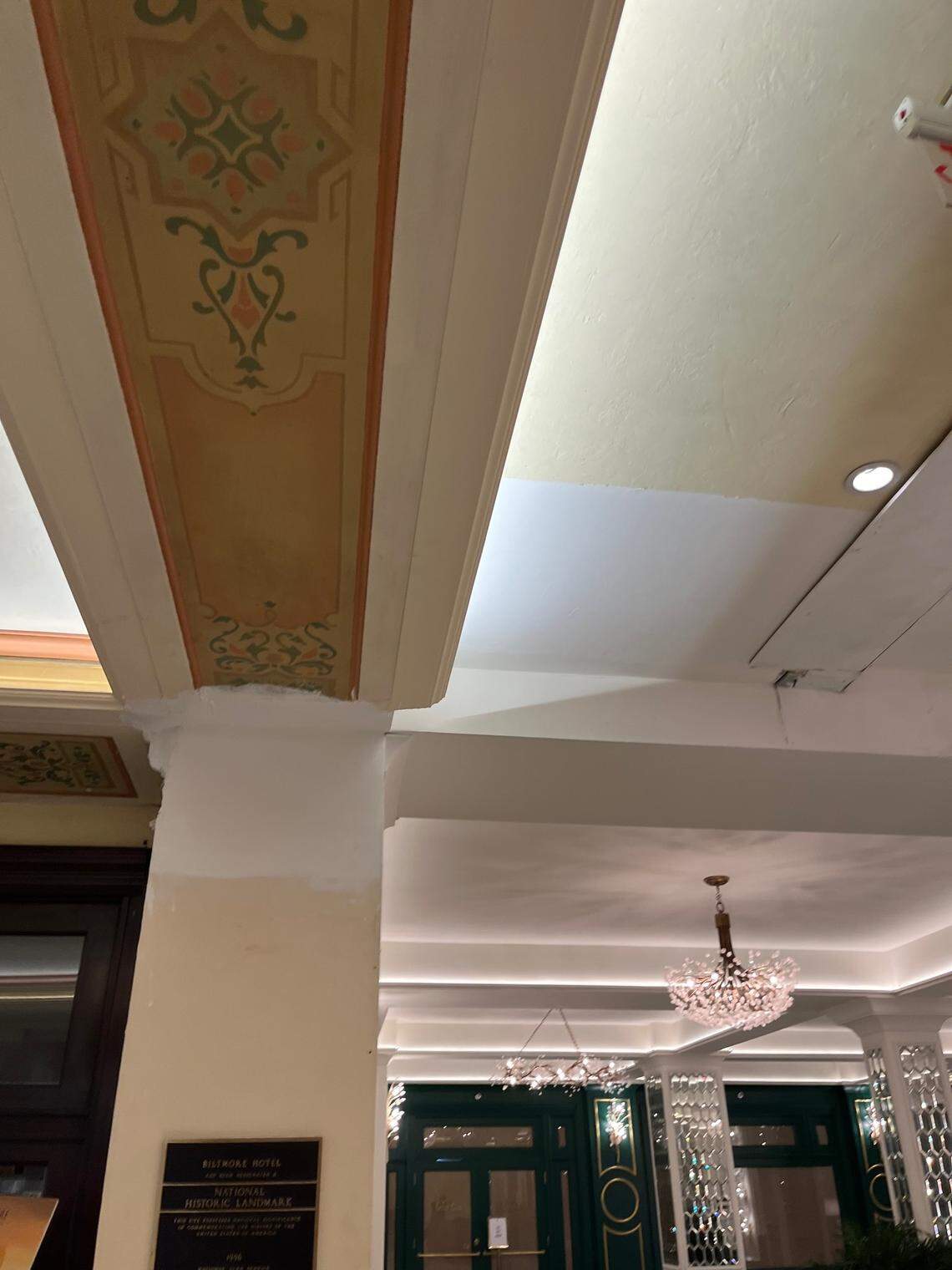 Coral Gables halted unauthorized renovation work in the lower lobby of the city-owned Biltmore Hotel that covered architectural features such as stencils and historic colors on columns and ceiling beams with white paint and mirrored glass.