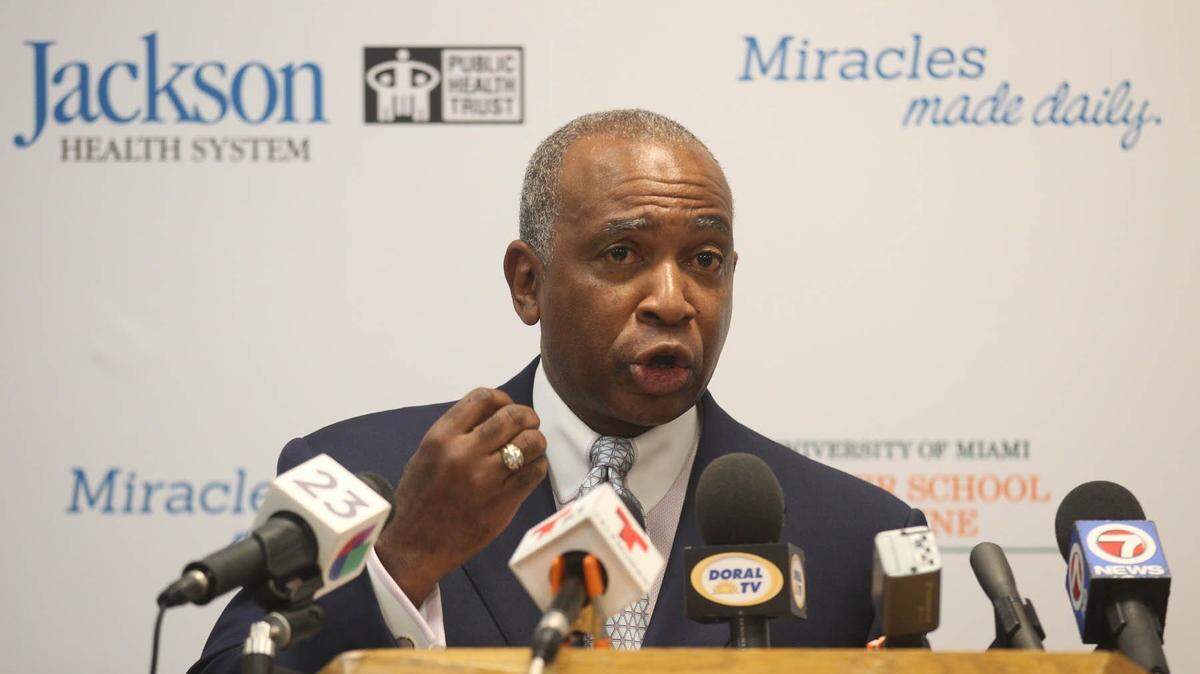 In this 2015 file photo, Darryl Sharpton, former chairman of the Public Health Trust that manages Jackson Health System, Miami-Dade’s taxpayer-owned hospital network, announces plans for a new facility. On March 7, 2019, Sharpton was sentenced in federal court to three years and three months in prison for tax evasion.