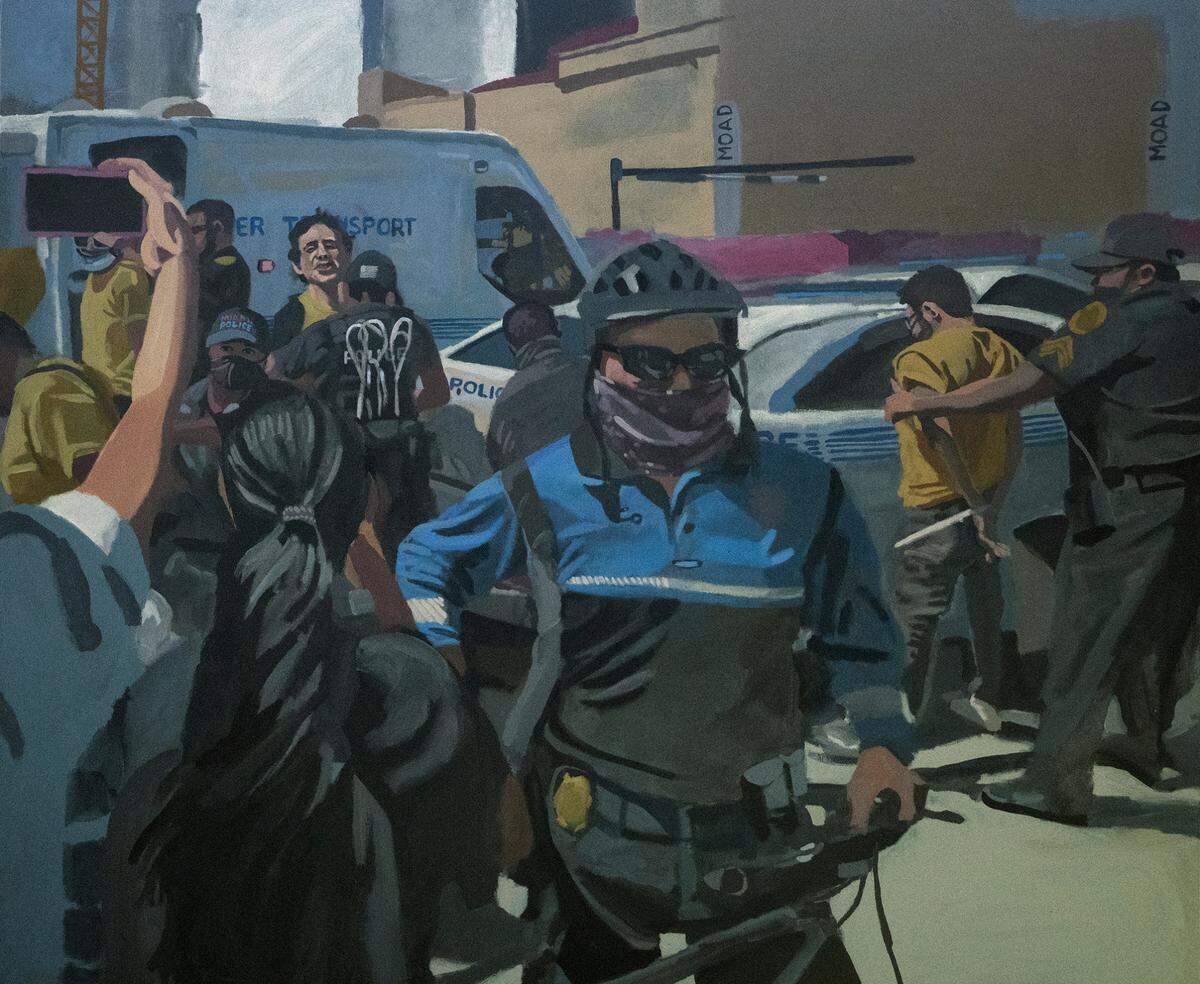 “October 18, 2021, 1:40 p.m.” by Eddie Arroyo depicts a moment of protest. It is part of the show “Talking to Real Americans” at Spinello Projects through March 19, 2022.
