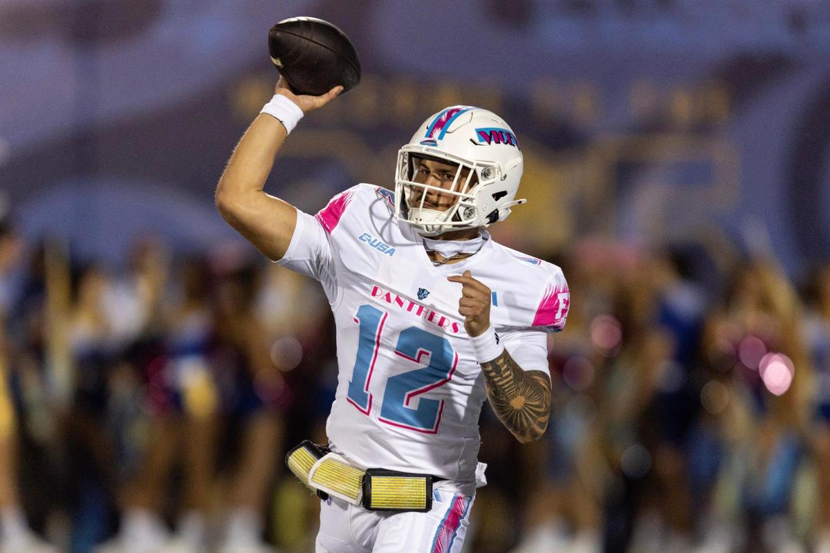 Florida International University Panthers quarterback Chayden Peery (12) throws the ball during the second quarter of a NCAA Conference USA football game against Sam Houston State Bearkats on Tuesday, October 22, 2024, in Miami, Fla.