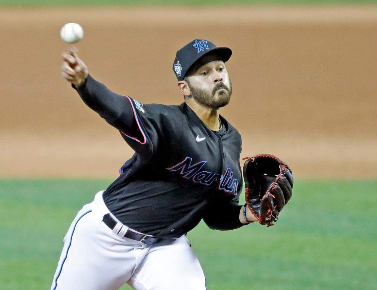 Miami Marlins starting pitcher Pablo Lopez (49) pitches in the first inning as the Miami Marlins host the Tampa Bay Rays at Marlins Park in Miami on Saturday, August 29, 2020.