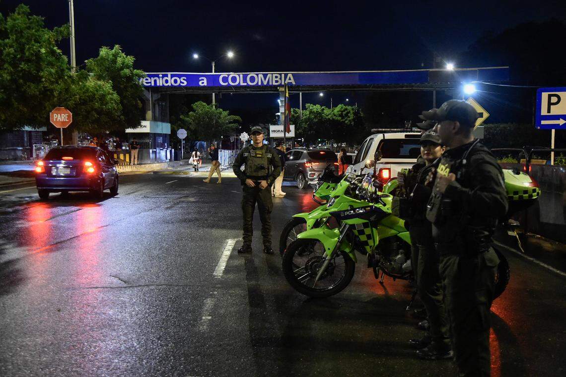 Colombian Police officers stand guard in Cucuta, at a border crossing with neighboring Venezuela, on January 3, 2026, after US forces had captured Venezuelan leader Nicolas Maduro after launching a "large scale strike" on the South American country.