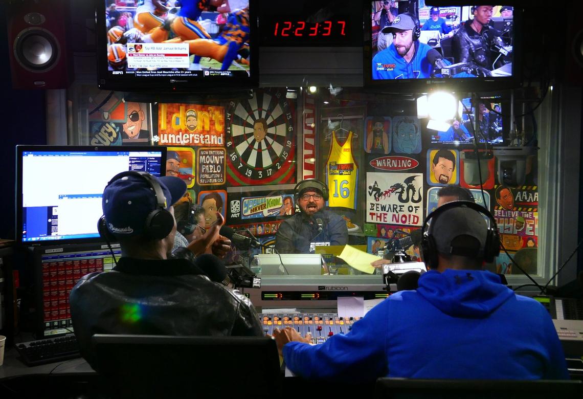 Miami Beach, Florida, December 18, 2018- Dan Le Batard (center) in the sound booth in the ESPN studios at The Clevelander Hotel in South Beach during the Dan Le Batard Show with Stugotz .