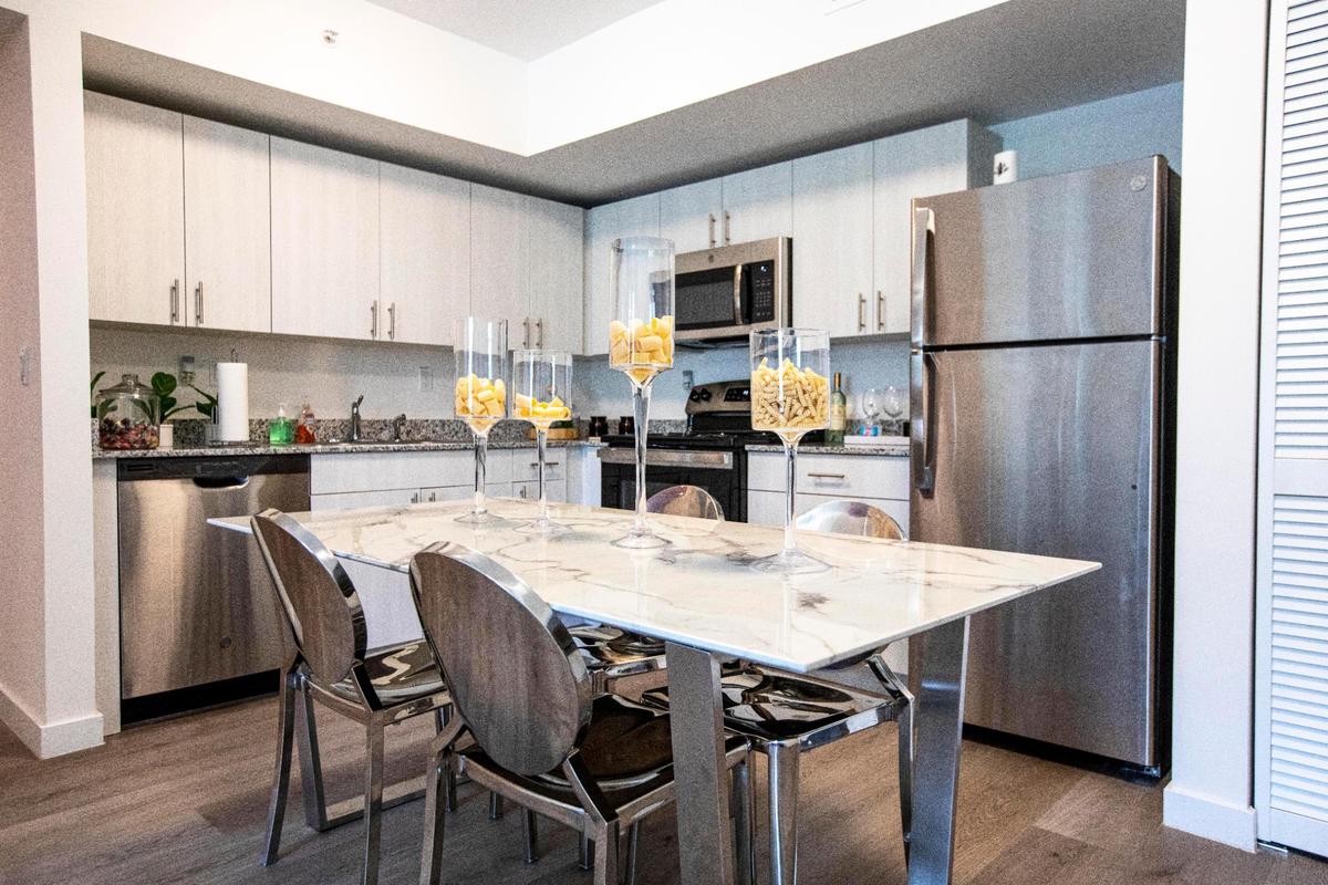 The kitchen of a 2/2 apartment in the Phase 2 block of Eden at Liberty Square, a public housing complex that offers affordable apartments, in Miami, Florida, on Tuesday, May 18, 2021. Eden at Liberty Square is Related Group’s $300 million redevelopment of Liberty Square.